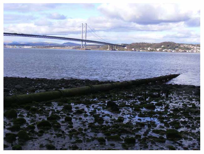 Photograph 3.11: The Ferry Burn outfall discharging into the Firth of Forth