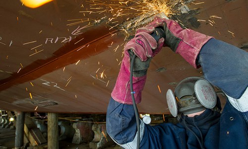 Worker carrying out welding