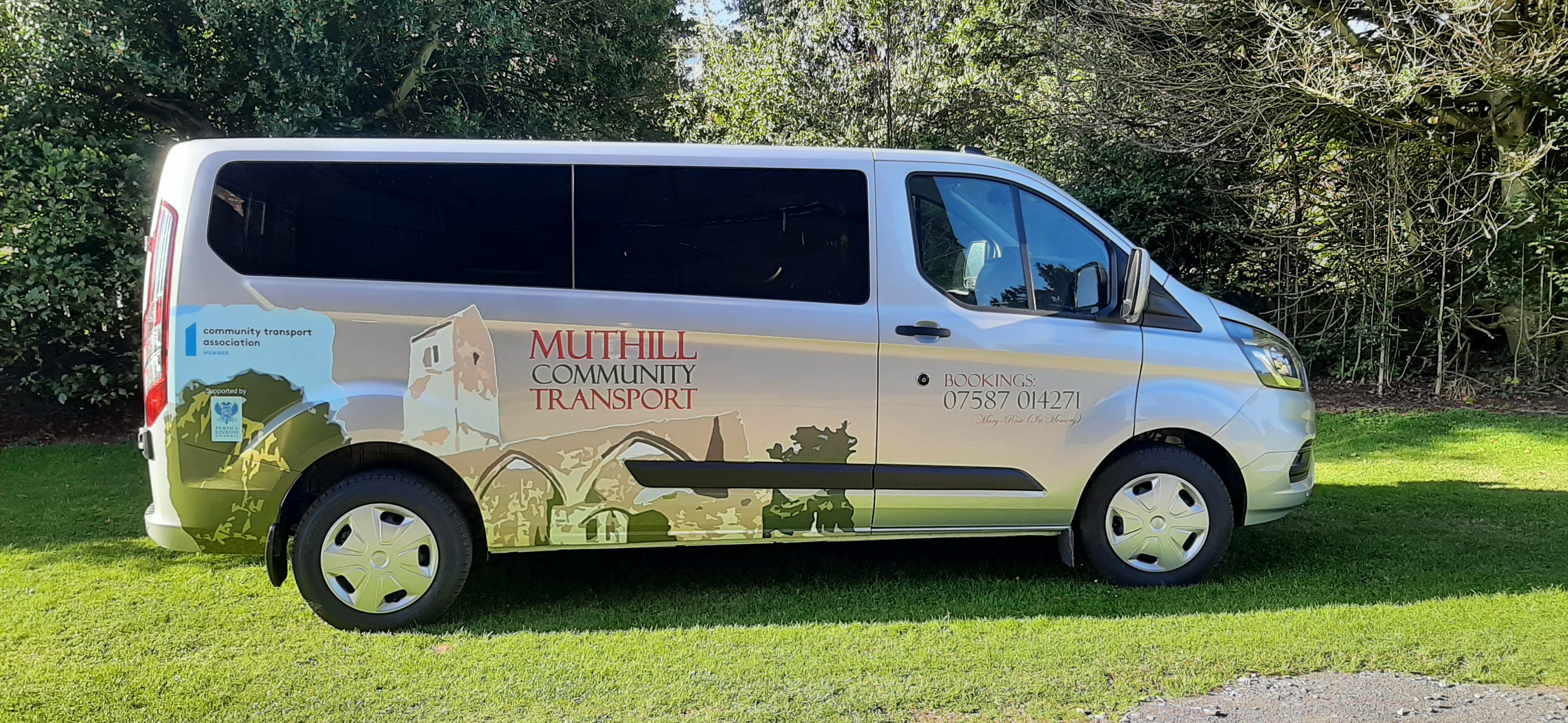 A photograph of a community transport bus