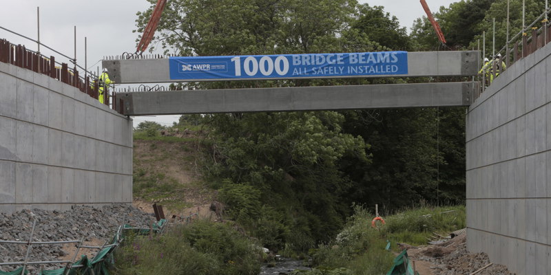 AWPR 1000th beam lifted into place