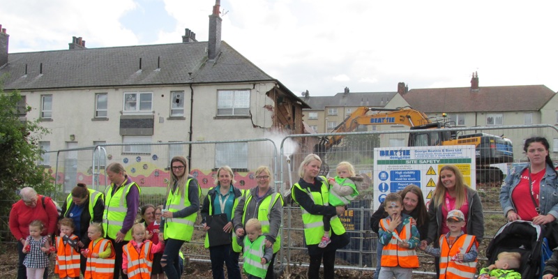 Nursery staff, children and parents attending the event