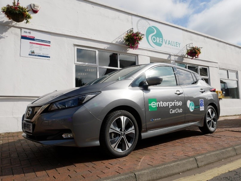 An electric vehicle outside Ore Valley Housing Association.