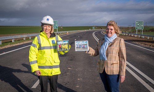 Transport Minister Jenny Gilrith standing with community members at the Maybole Bypass opening