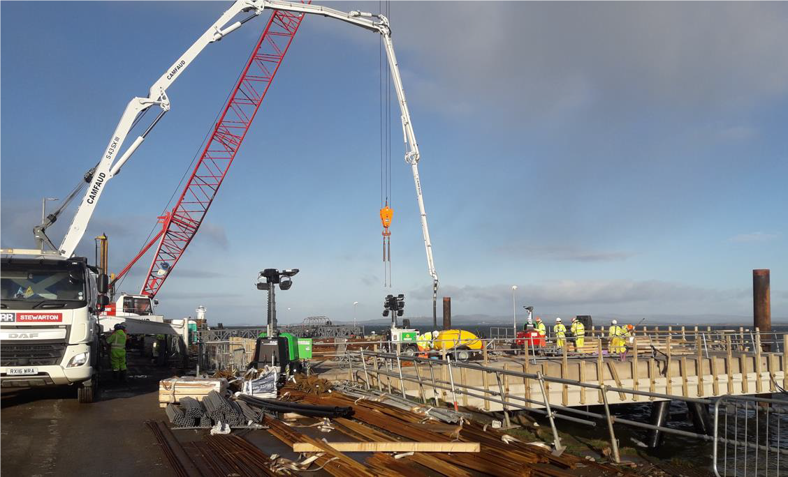 Concrete is poured on to the decks at Troon Harbour construction site.