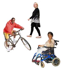 a walking woman, a man on a bike and a woman who is a wheelchair user.