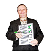 a smiling man holding a checklist with green ticks against 2 of the 4 items.