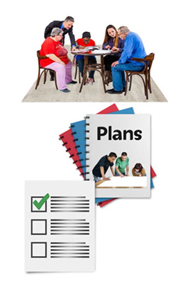 A group of people looking at documents at a meeting table. A pile of plan documents. A checklist with a green tick in the first of 3 boxes.