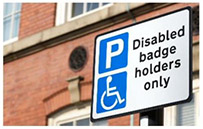 Canva image of a disabled badge holders Parking sign, with the white and blue P sign and the white and blue wheelchair symbol.