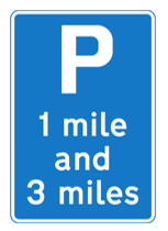 Blue sign with a P and saying '1 mile and 3 miles'