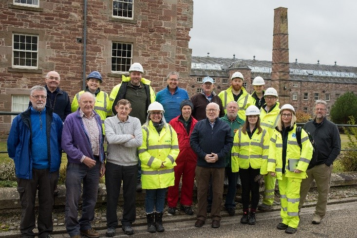 The team of volunteers with the Stanley ‘Shedders’ outside Stanley Mill