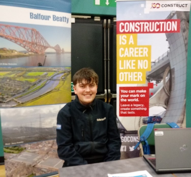 Elliot promoting apprenticeships at a school career event at Perth Academy