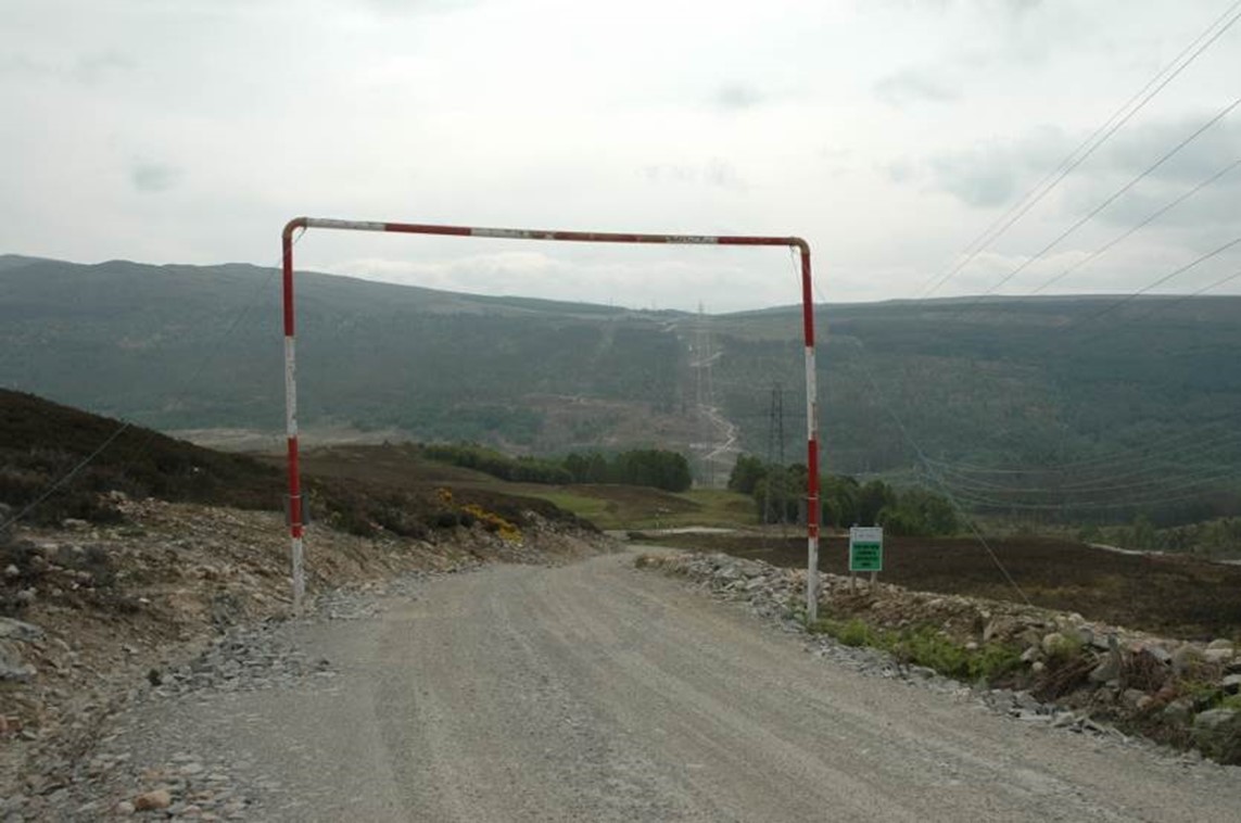 Hilltop gravel road with snow gates