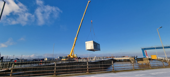 Terminal building being hosted into place.