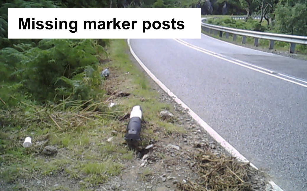 Marker post next to road knocked over