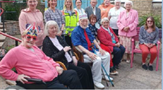 Group of people wearing bright clothes