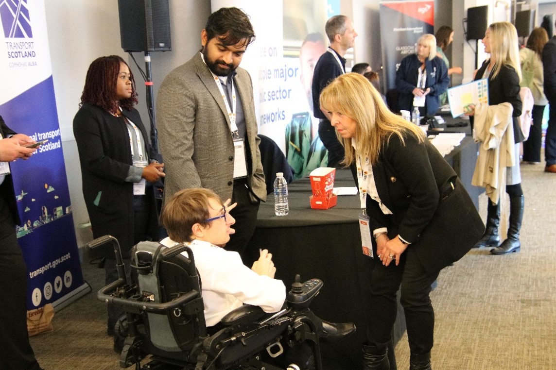 Figure 1. Transport Scotland staff engage with attendees at Meet the Buyer