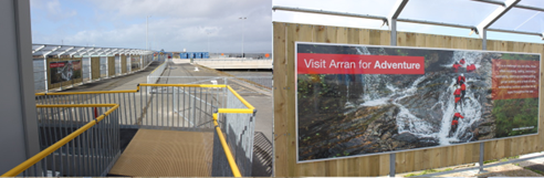 Exit ramp from terminal building and Visit Arran picture board.